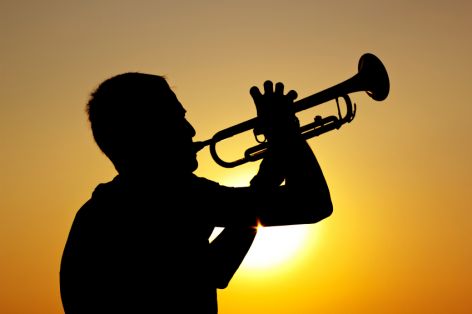 Image result for blowing on a trumpet